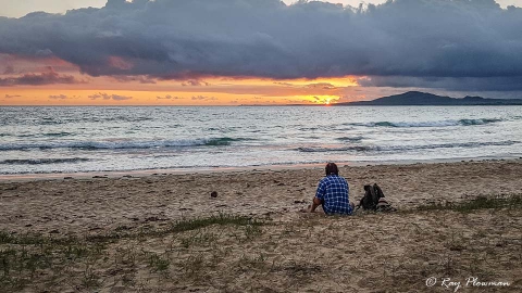 Watching the sunset from the beach at Puerto Villamil on Isabela Island Galapagos