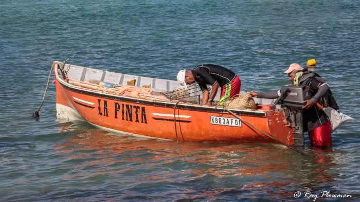Fishers preparing La Pinta Fishing Boat at Mahebourg waterfront in Mauritius